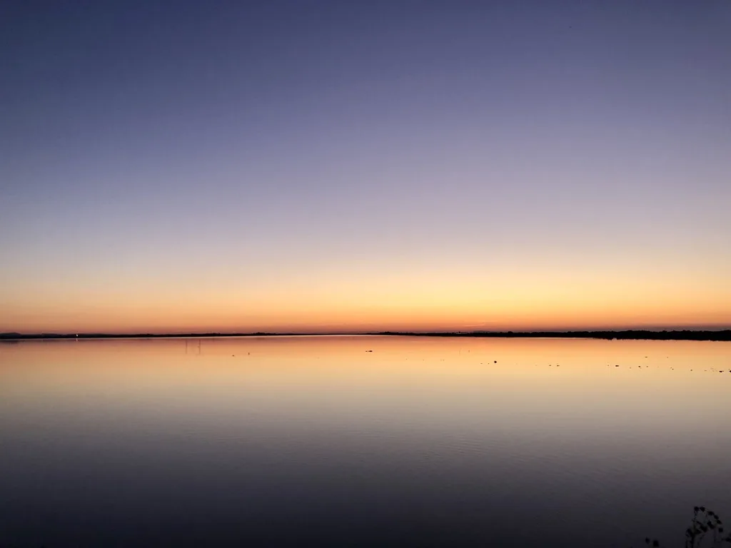 Sunset over calm waters