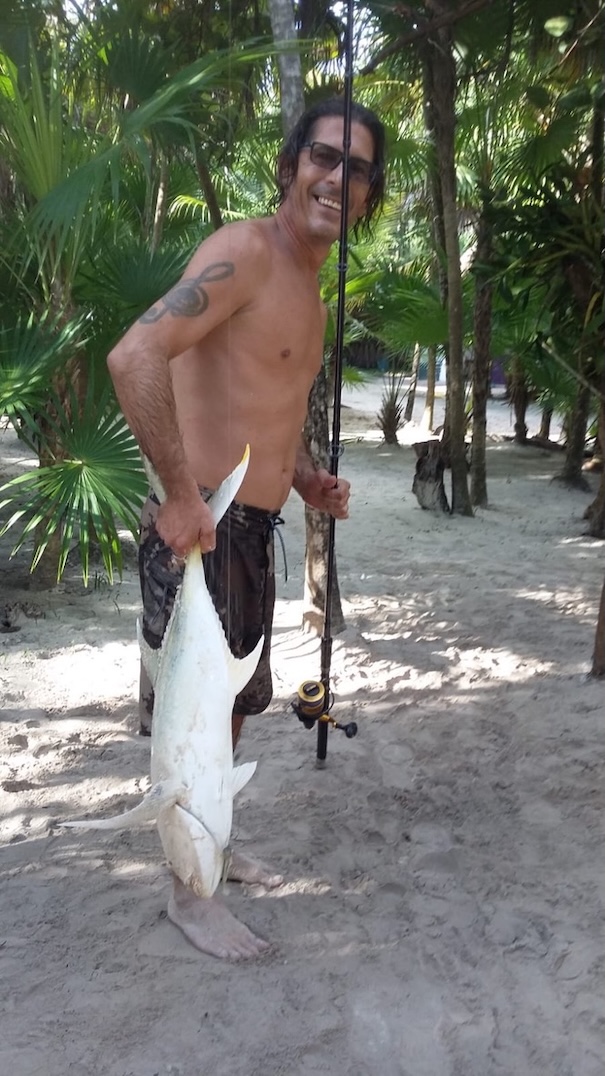 Shore fishing on a tropical beach, remote area